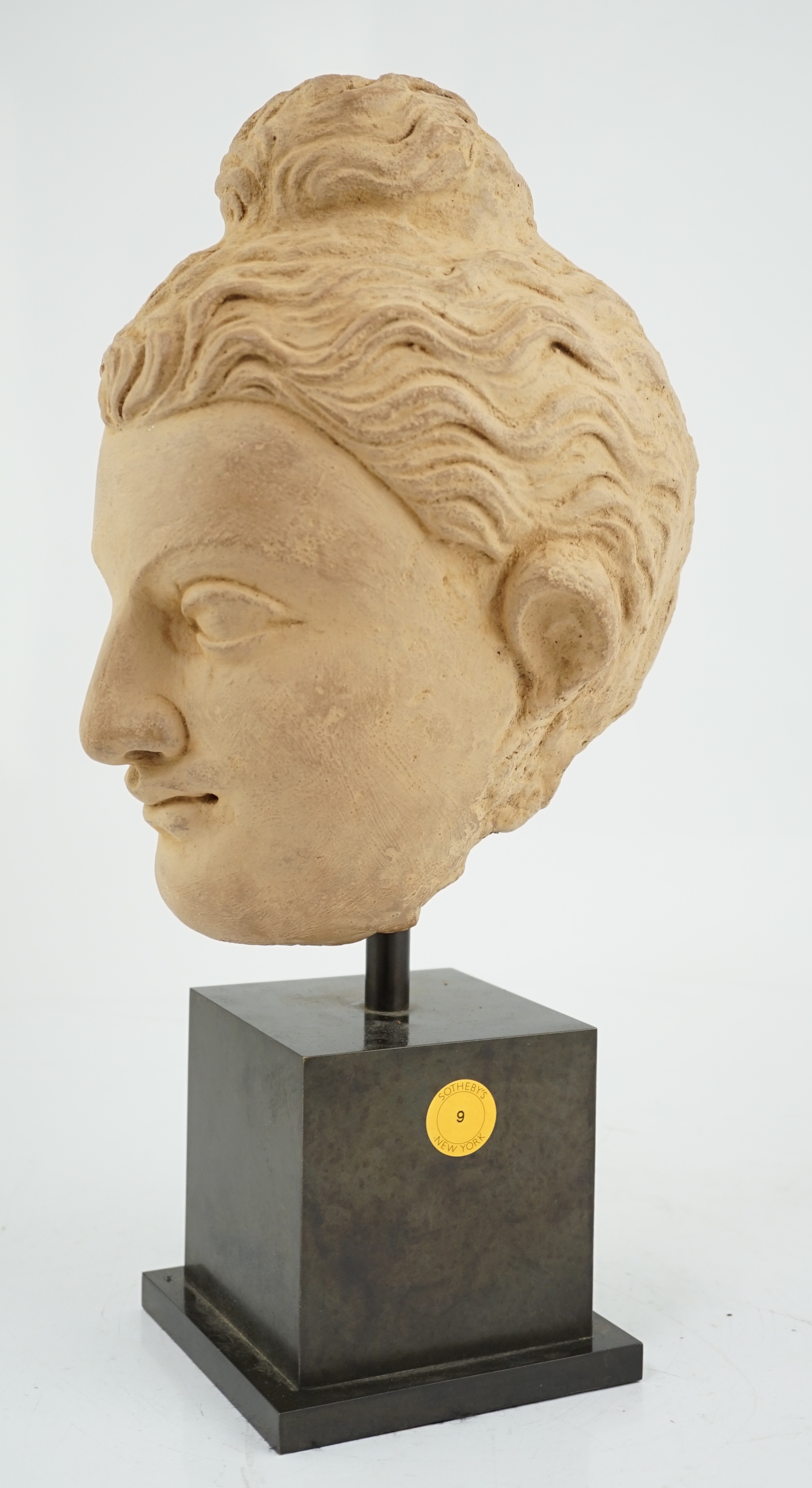 A stucco head of Buddha, Gandhara, Kushan period, 3rd/4th century AD